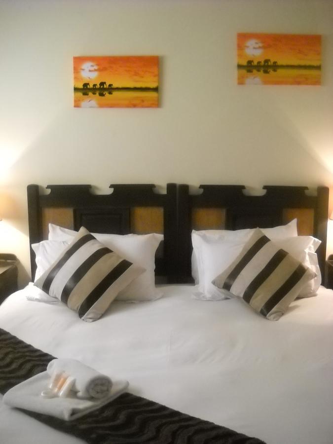 פאלאבורווה The Beverly Hills Guest Lodge חדר תמונה